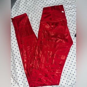 Red lululemon size 4 leggings. Worn once.